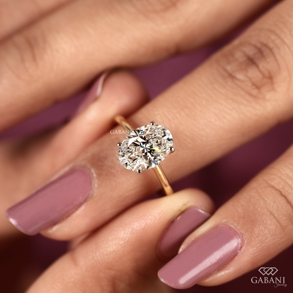 oval cut lab grown diamond ring in yellow gold designed for everyday comfort and elegance