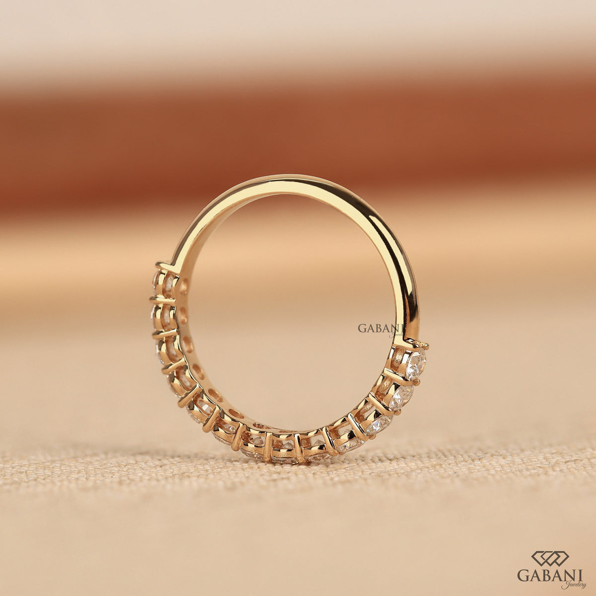 Rose gold minimal wedding band with round lab grown diamonds and slim design