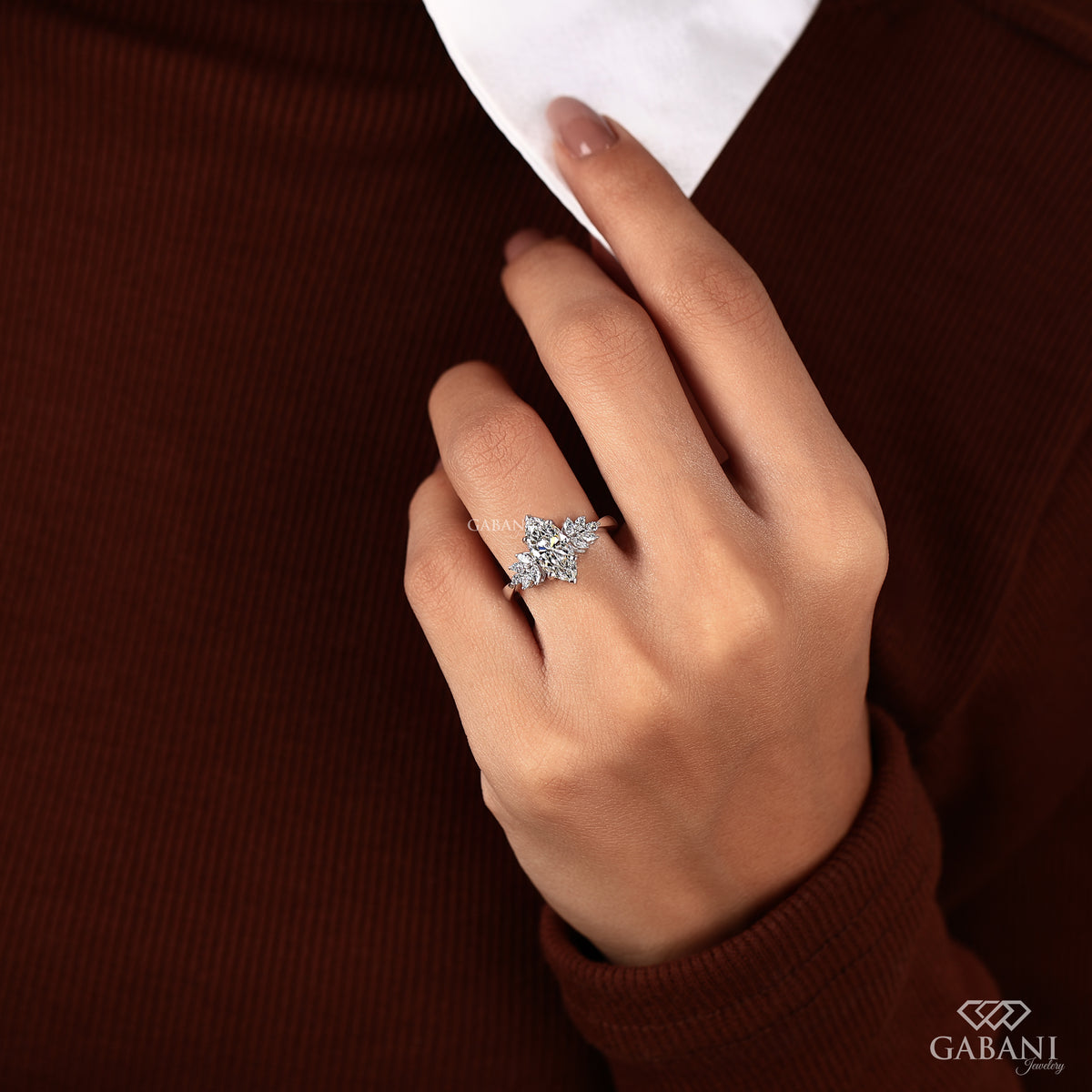 Marquise diamond engagement ring in white gold with clean modern handcrafted design