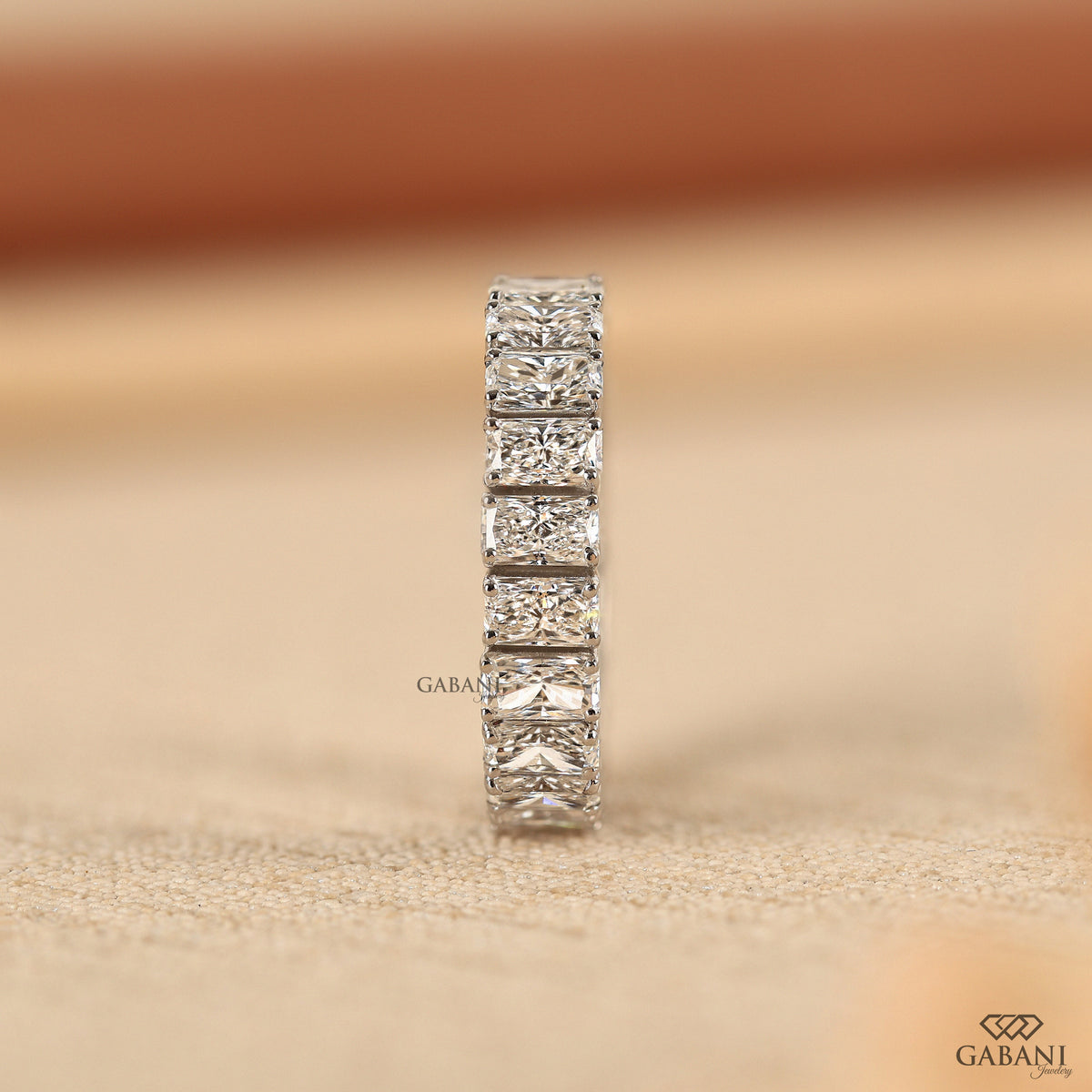 Solid white gold full eternity band with certified lab grown radiant diamonds