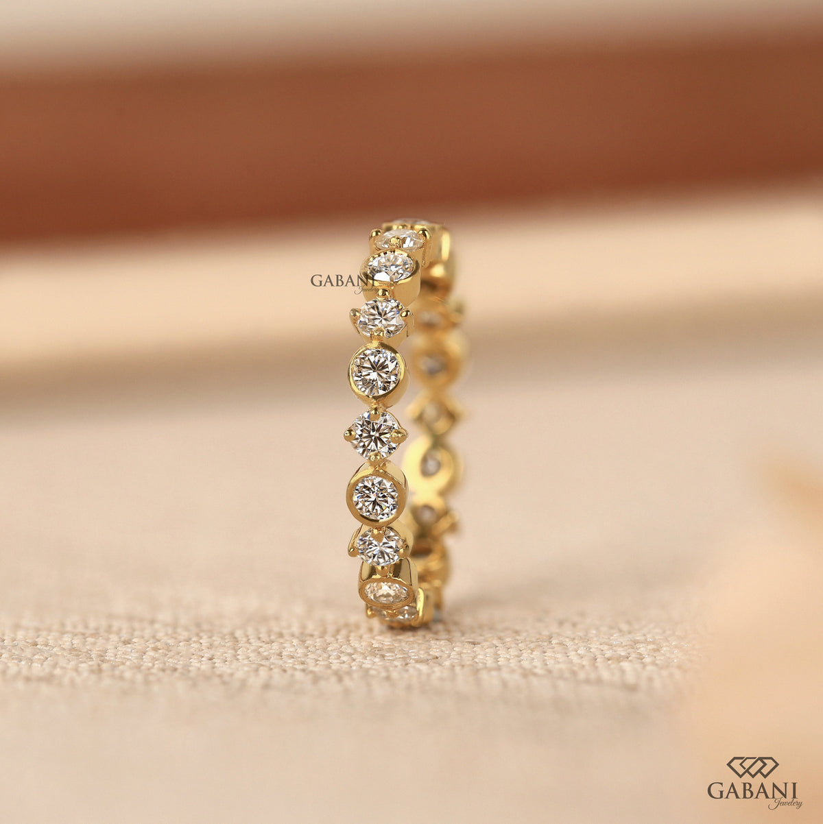 round diamond wedding band featuring full eternity lab grown diamonds in yellow gold
