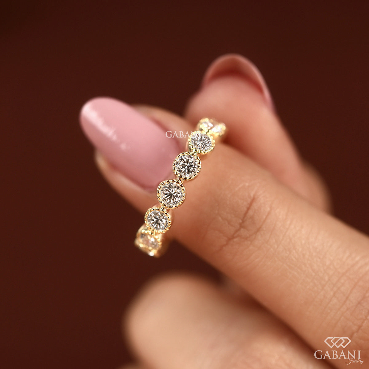 round lab diamond matching band in 14k gold with milgrain eternity setting