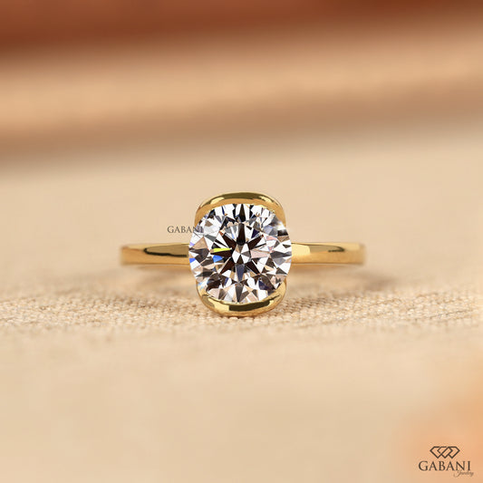 half bezel set round lab grown diamond solitaire ring in yellow gold
