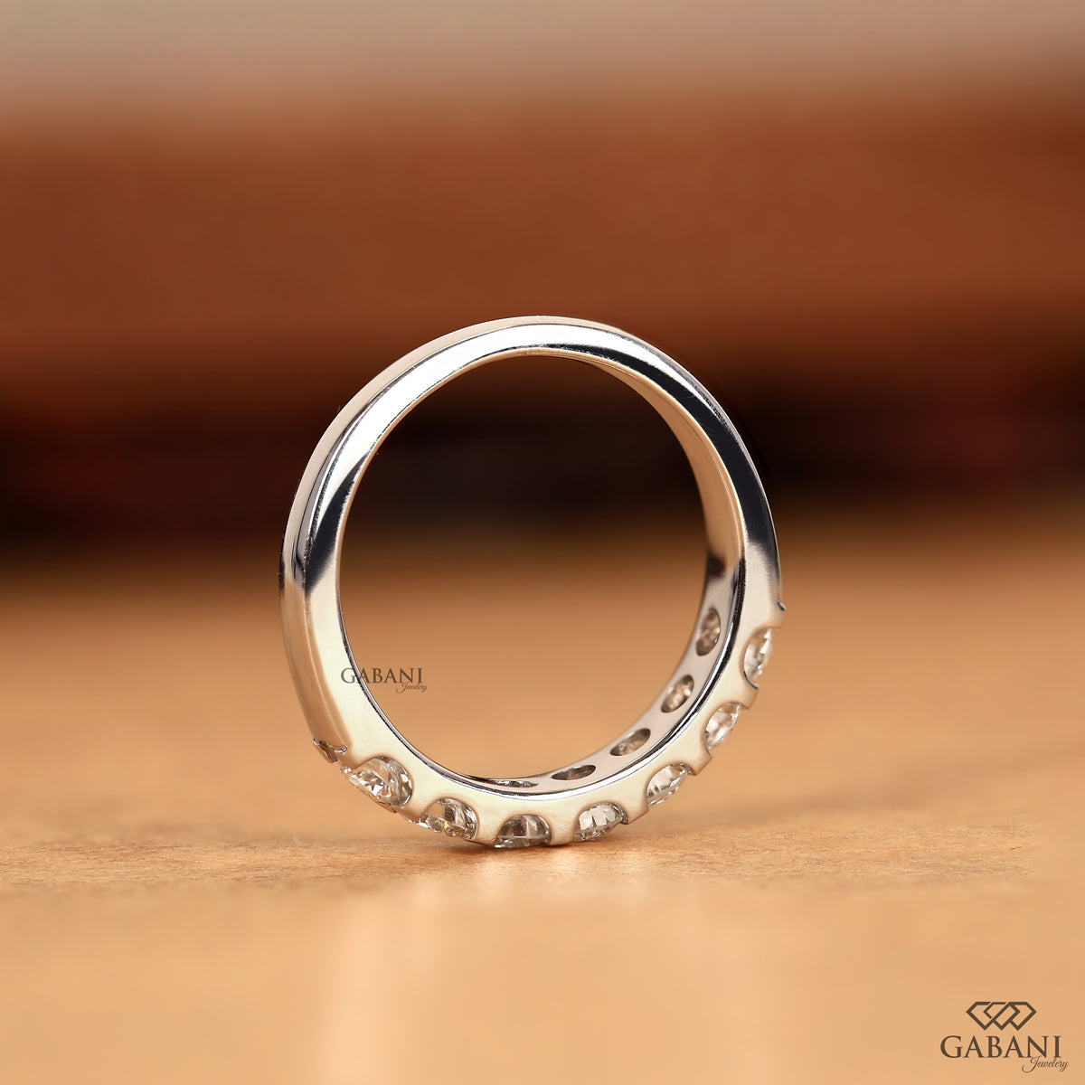 seven round diamond lab grown band in polished white gold French pavé comfort fit band