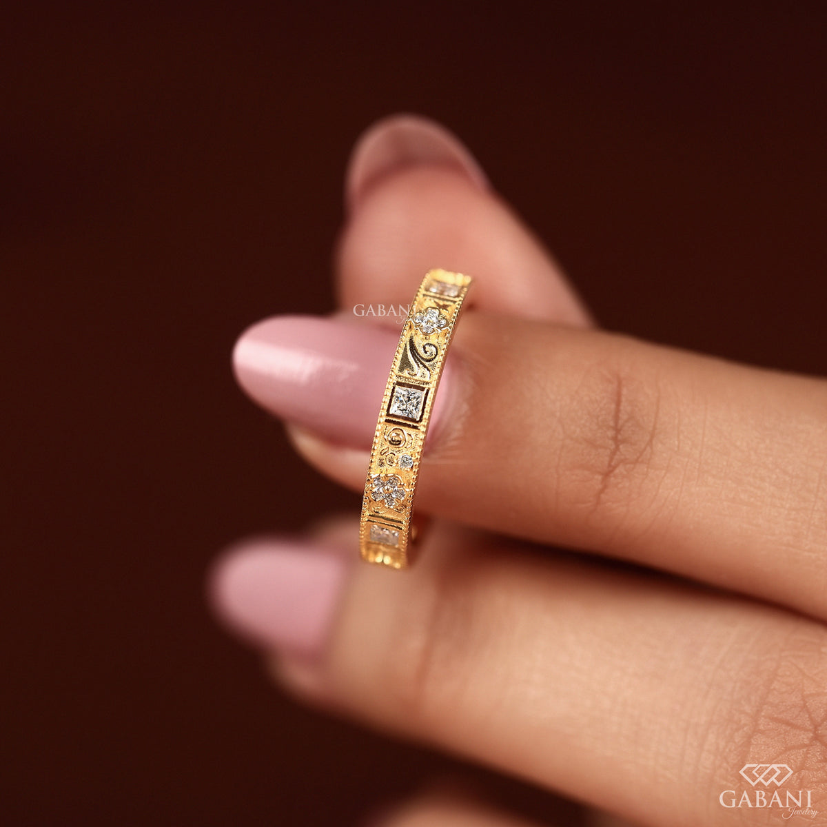 milgrain eternity band with engraved floral pattern and princess cut lab grown diamonds in gold