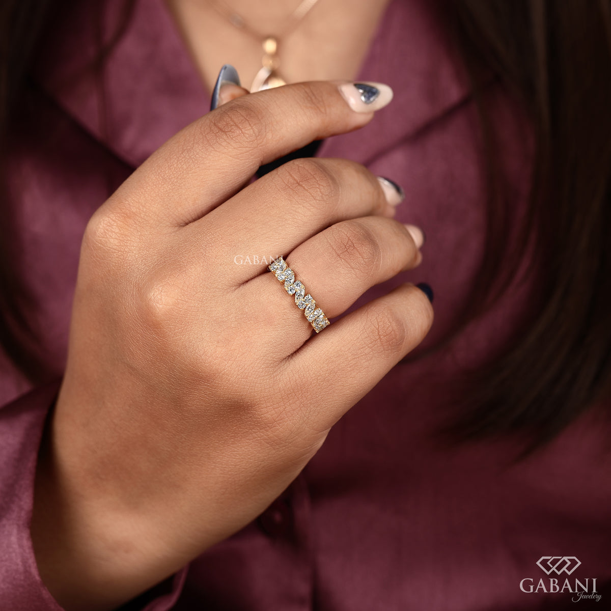 yellow gold wedding band with alternating marquise and round lab grown diamonds in a refined half eternity layout