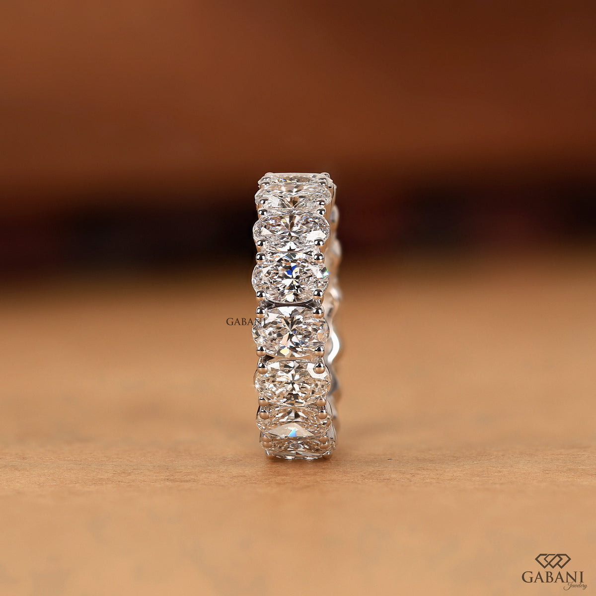 oval lab grown diamond chunky eternity band in white gold for women